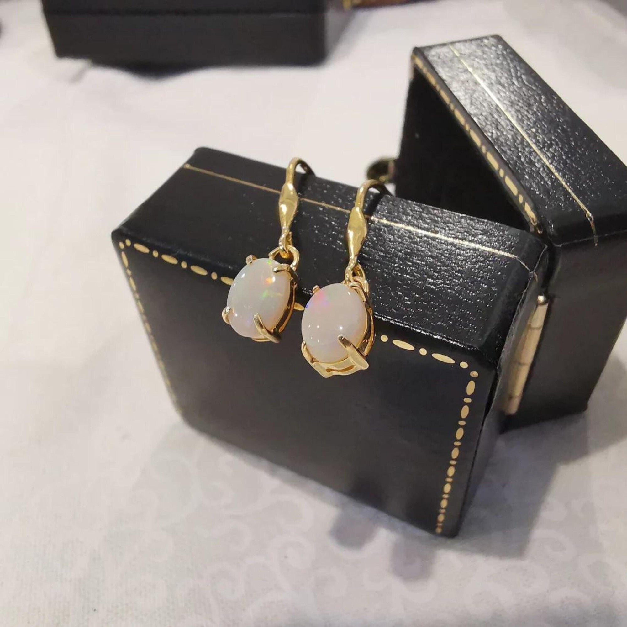 Solid opal dangle earrings