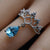 Crown blue topaz ring