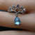 Crown blue topaz ring