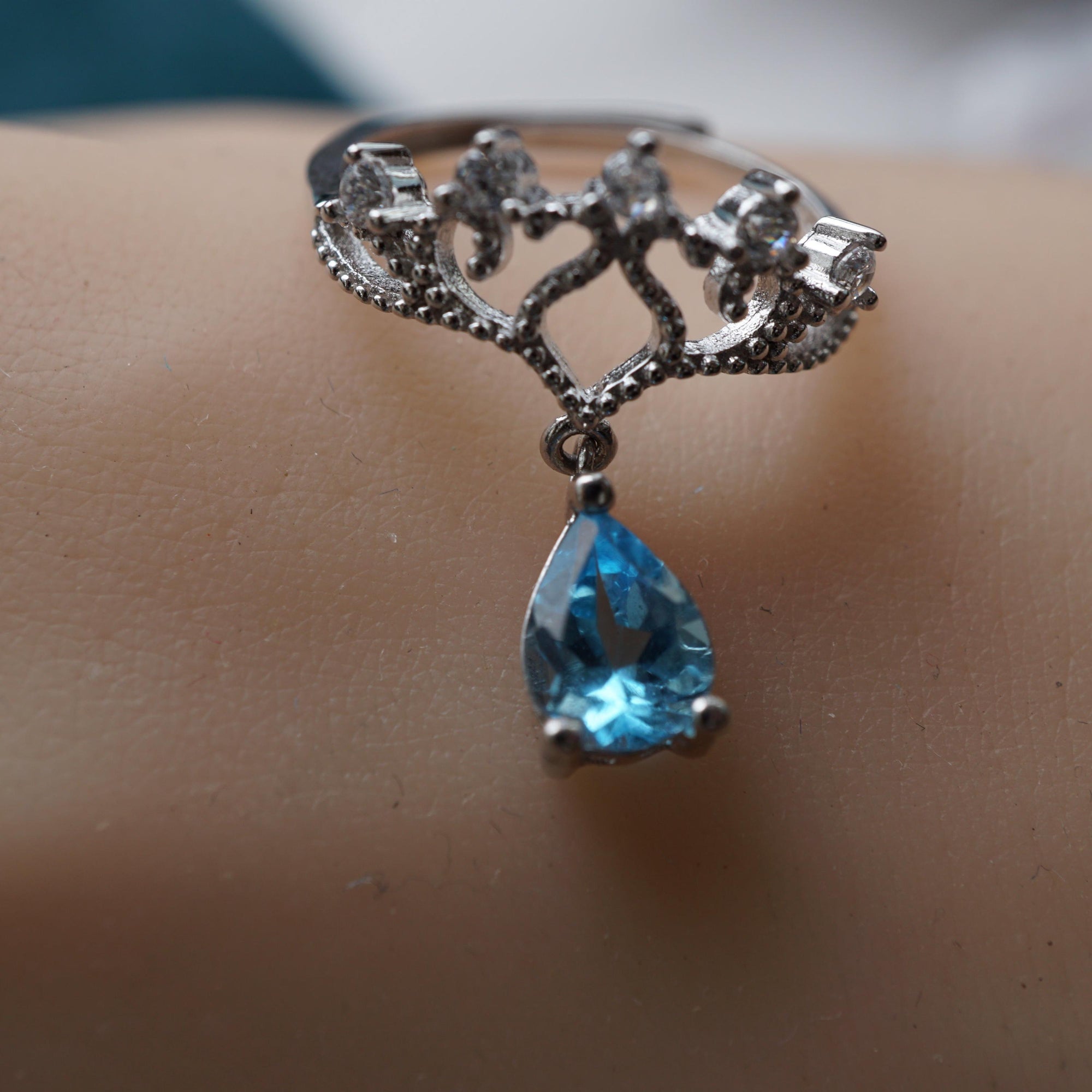 Crown blue topaz ring