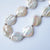 Natural freshwater big baroque coin shaped pearl necklace & bracelet set